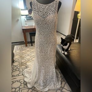 Beautiful rhinestone wedding dress size 10 Open back with long train